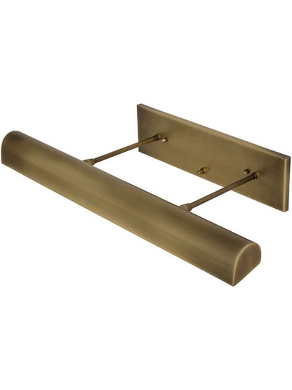 Modern Direct-Wire 24 inch Picture Light in Antique Brass.